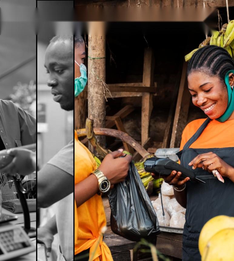 A market trader accepting a card payment from a customer